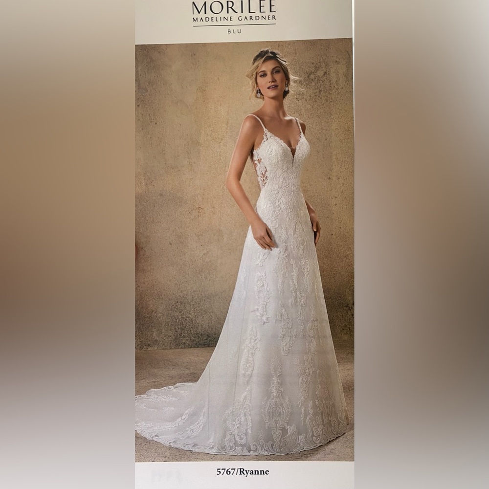 Morilee Madelyn Gardener Wedding Dress with lace appliqués on an A Line